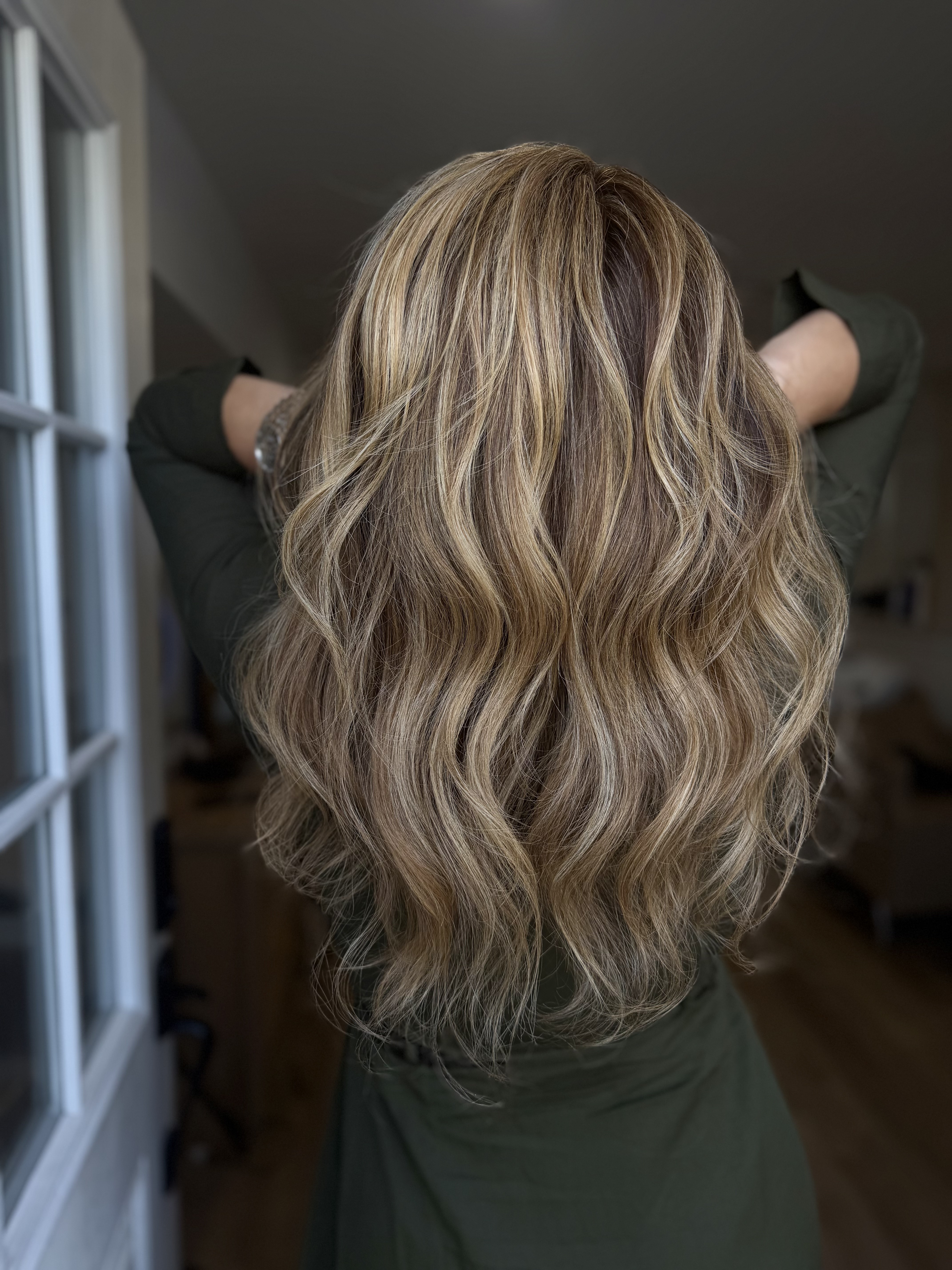 Soft blonde balayage by Veil & Vogue